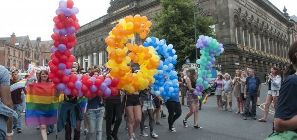 Image may contain: Urban, Parade, Festival, People, Shorts, Crowd, Ball, Balloon, Apparel, Footwear, Clothing, Shoe, Person, Human