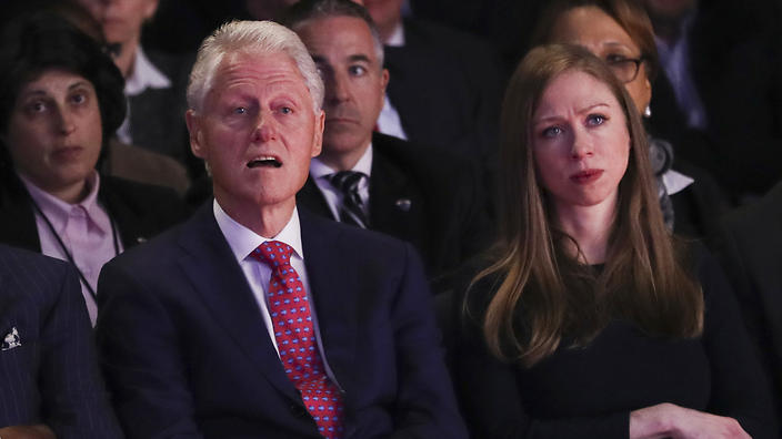 Former President Bill Clinton and Chelsea Clinton, daughter of Hillary Clinton listen during the presidential debate between Republican presidential nominee Donald Trump and Democratic presidential nominee Hillary Clinton at Hofstra University in Hempstead, N.Y., Monday, Sept. 26, 2016. (Joe Raedle/Pool via AP)
