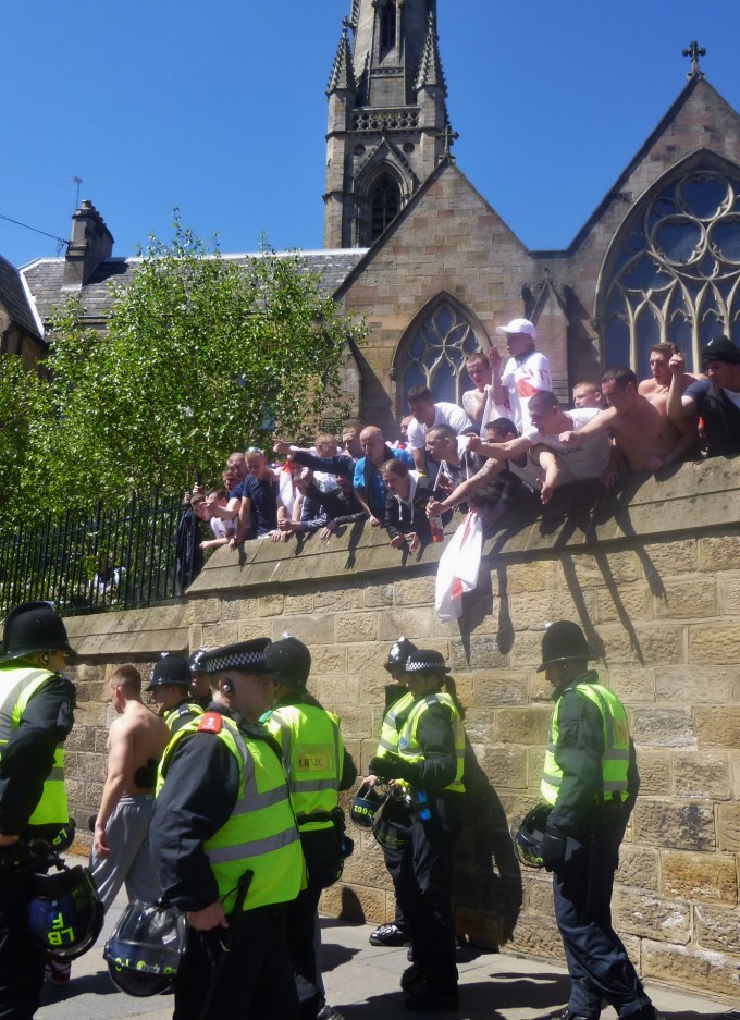 Marcher gets removed by the police.