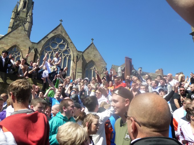 Estimated turnout 1,500-2,000. Lots of 'harmless' songs.