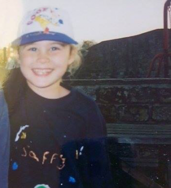 Sporting the classic goofy cap and custom tee combo