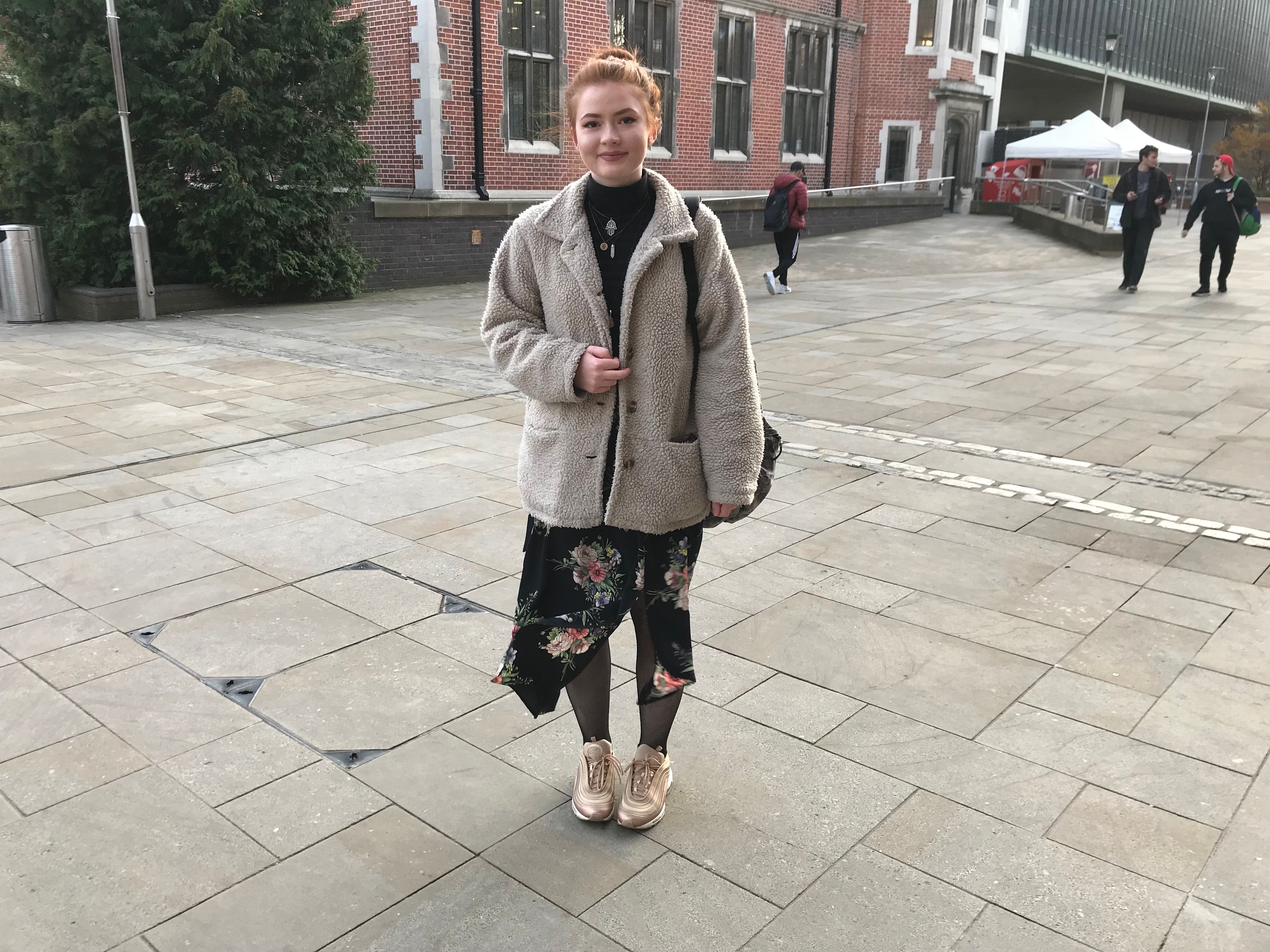 Image may contain: Coat, Person, People, Human