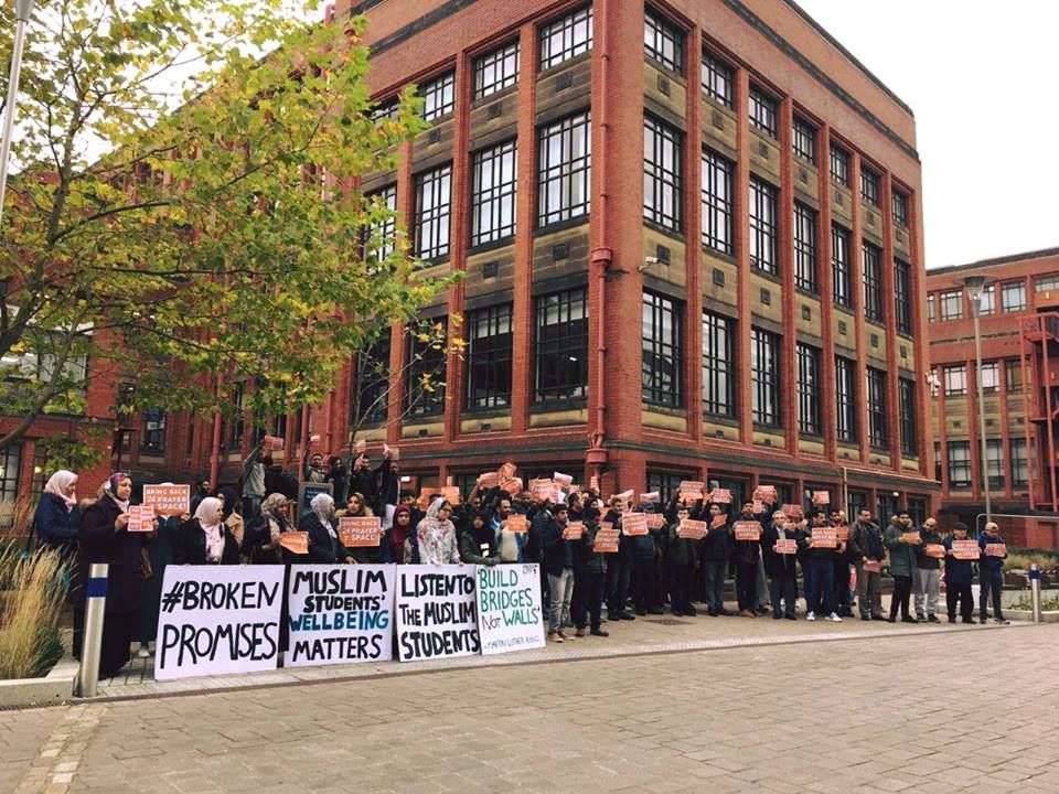 Image may contain: Crowd, Campus, Potted Plant, Plant