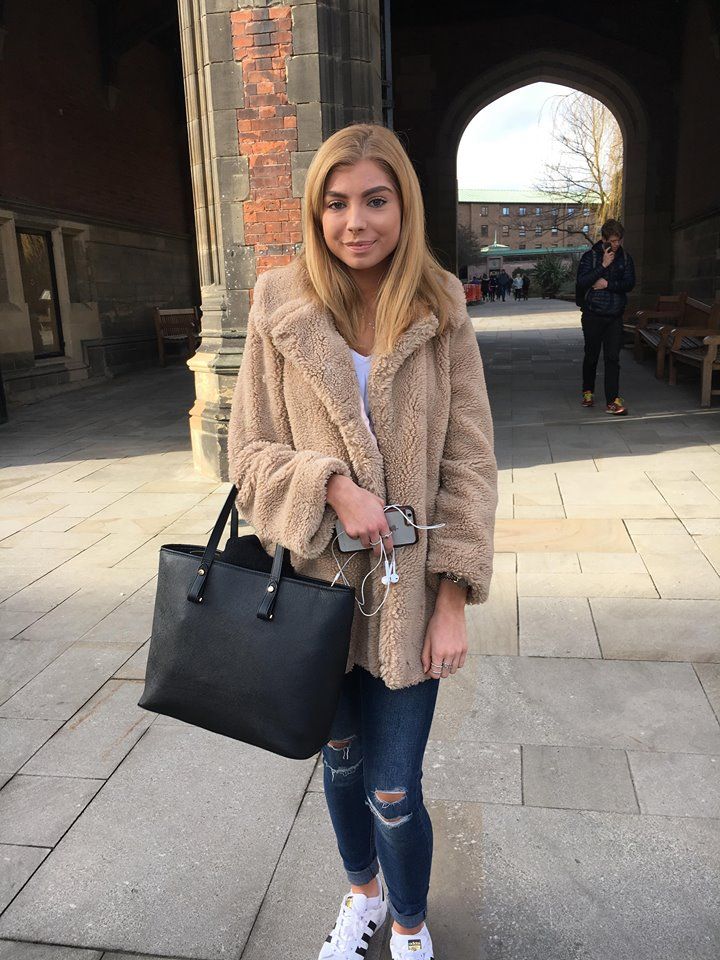 Image may contain: Brick, Building, Architecture, Arched, Arch, Person, People, Human