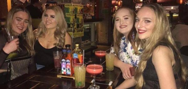 Image may contain: Night Life, Sink, Drink, Beverage, Alcohol, Glass, Person, People, Human