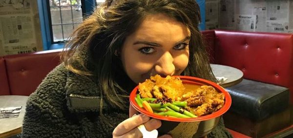 Image may contain: Face, Sweater, Apparel, Clothing, Lunch, Meal, Food, Eating, Human, Person