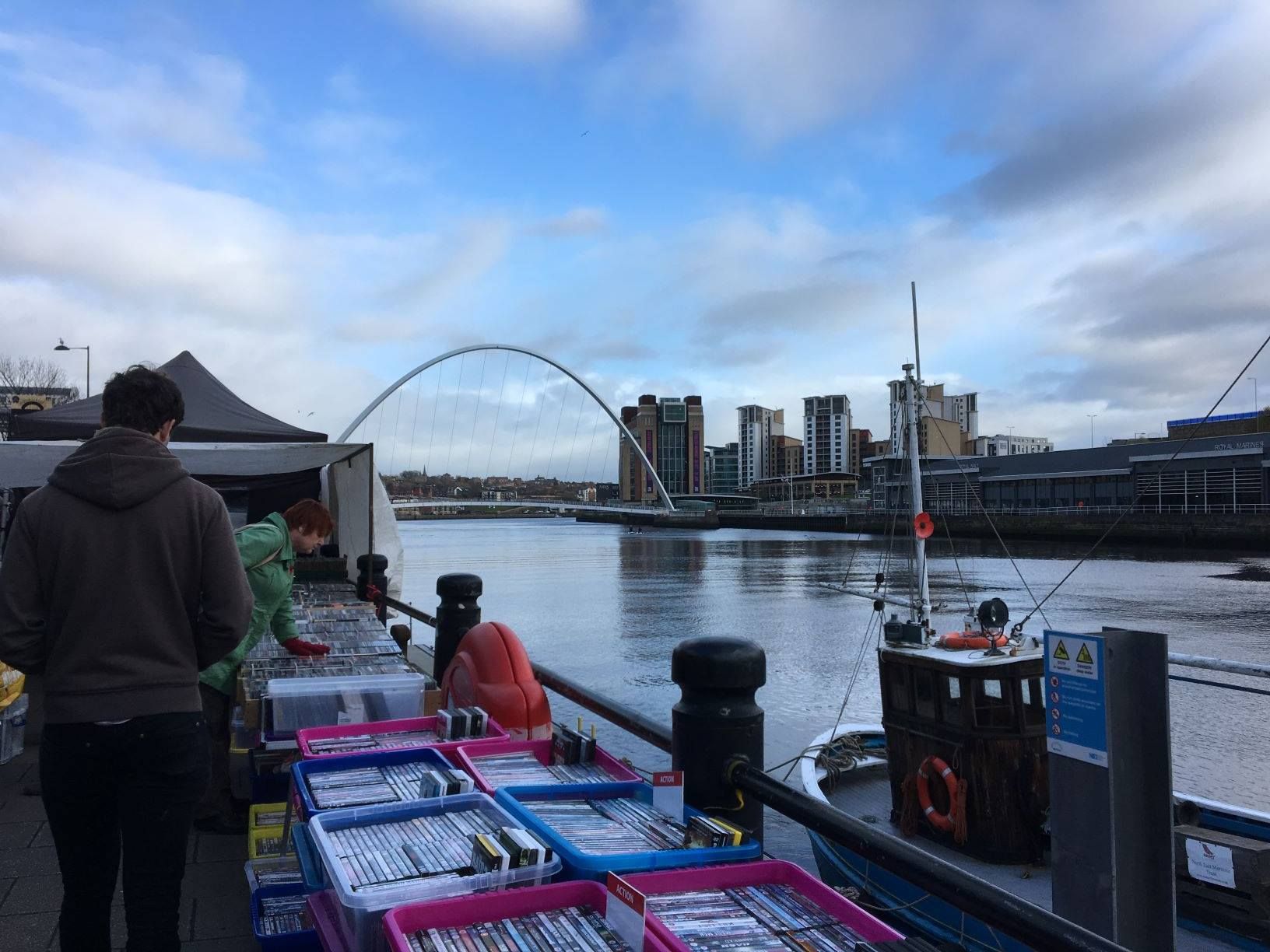 Image may contain: Dock, Port, Pier, Waterfront, Water, Boat, Arched, Arch, Architecture, Building, Transportation, Watercraft, Vessel, Vehicle, Person, Human