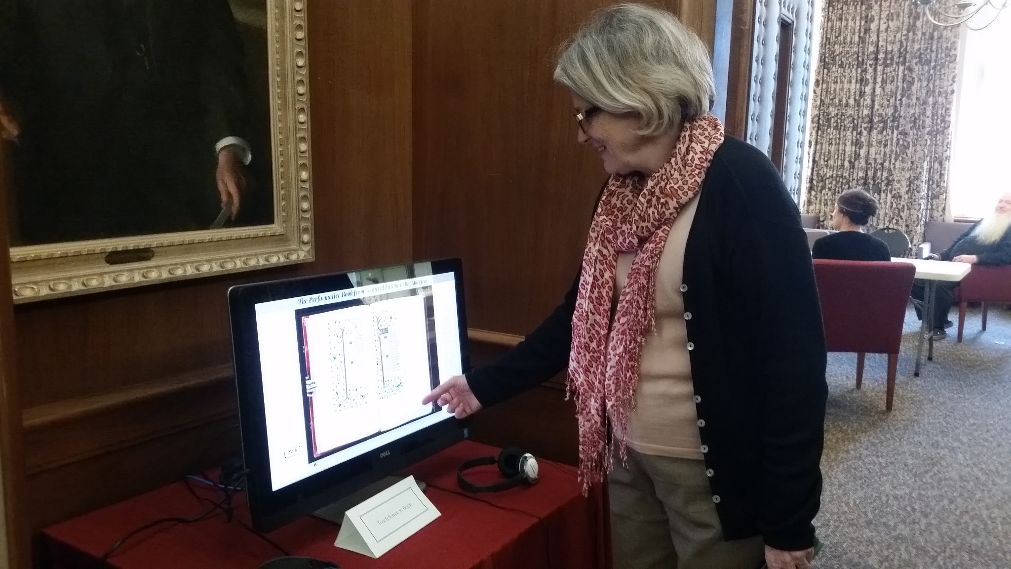 Cherry Williams, curator of manuscripts at the Lilly Library, pages through a digital version of a manuscript.