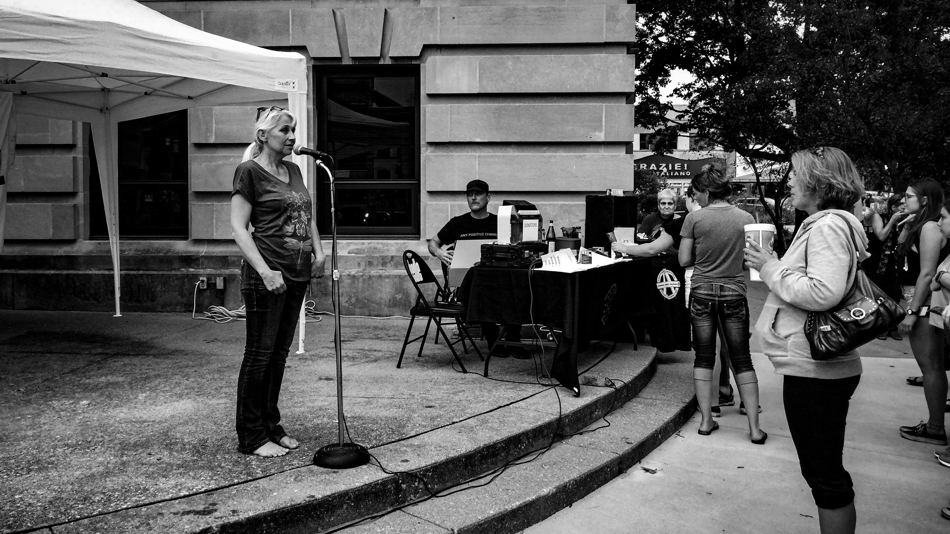Christie, one of the speakers at the vigil, shares her story about her husband.