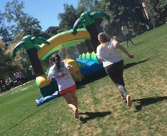 Running for the waterslide to cool off.