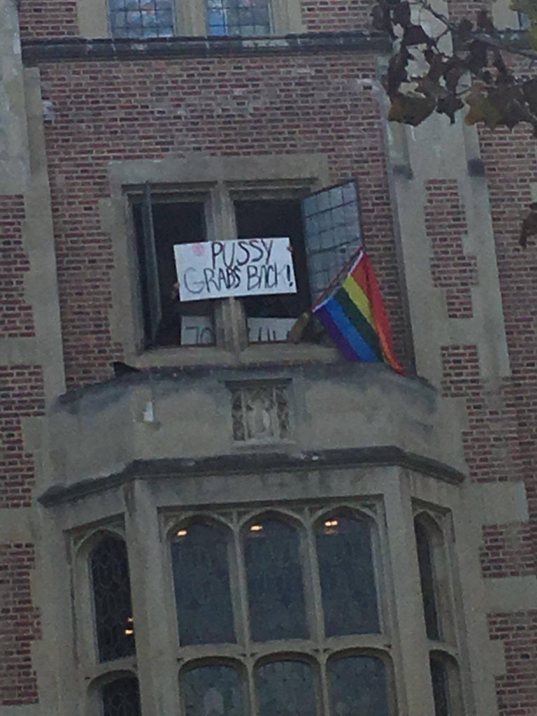 Students protesting from a nearby building