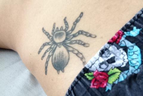 Tariq Moore's Spiderman themed tattoo represents his love of Marval and comics, a key part of his life.