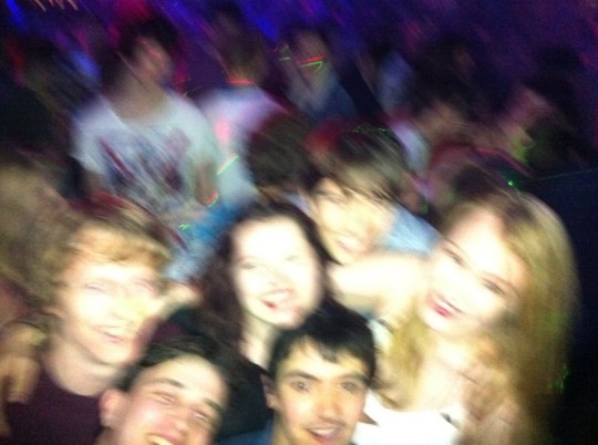 Surrounded by friends. And shoddy photographers
