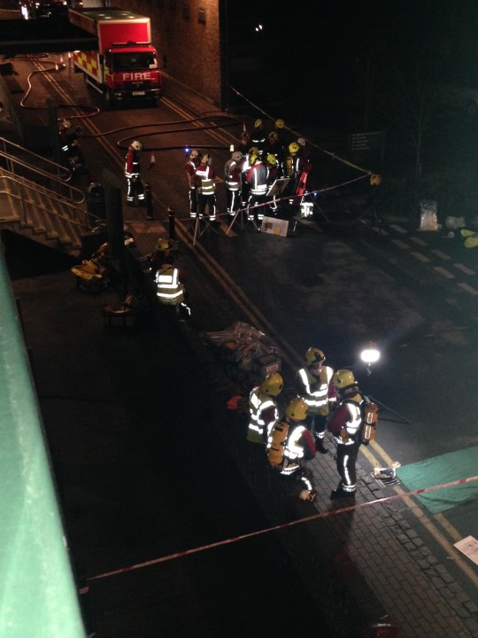 Over twenty firemen at the scene