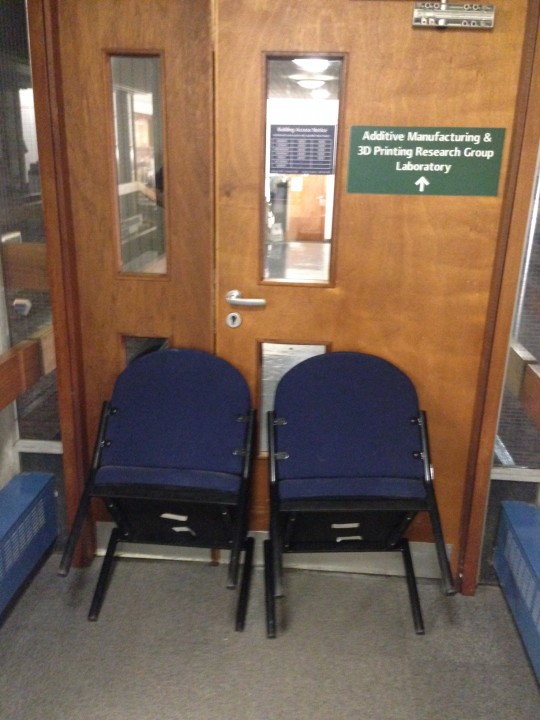 Chairs blocking the bridge to the lab