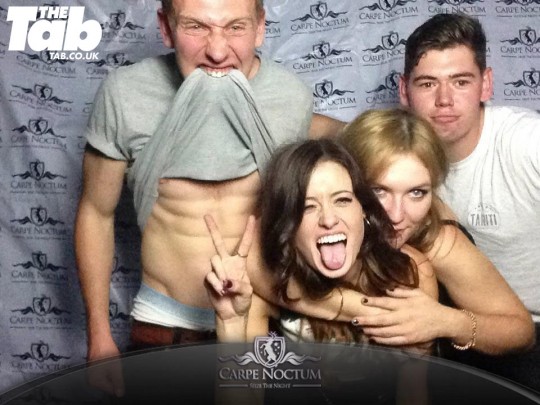We're sure that eating his t-shirt has nothing to do with the camera and those washboard abs...