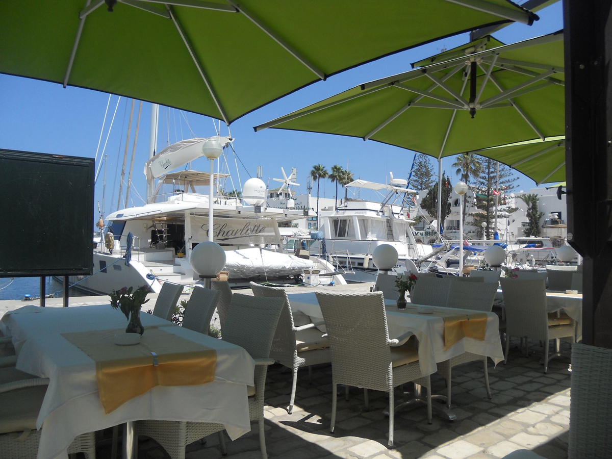 Anna and her brother had lunch on the harbour, unaware of what they'd escaped