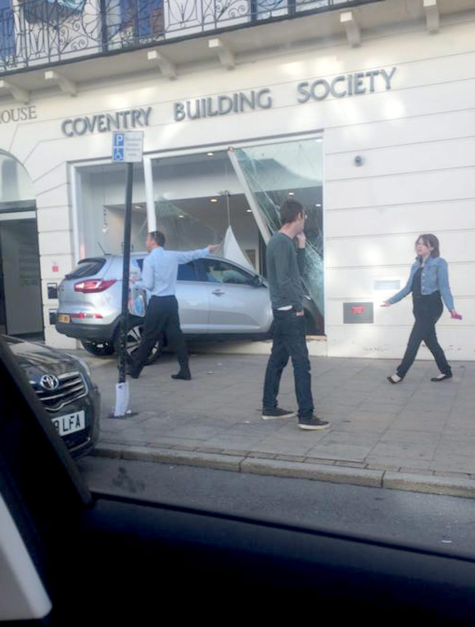 A car crashed through the window of Coventry Building SocietyÃs, Leamington town centre branch this morning. See NTI story NTIROBBERY. The incident happened shortly before 9am this morning as commuters made their way to work in the busy Leamington town centre. A grey Kia smashed through the front window of the building societyÃs upper Parade branch. Warwickshire Police are at the scene, but nobody has been arrested and it is not yet known if anyone has been injured. A spokesman for Warwickshire Police said: "We were called just after 8.30am to reports of a robbery at Coventry Building Society on the Parade, in Leamington Spa. Officers are currently at the scene dealing with the incident."