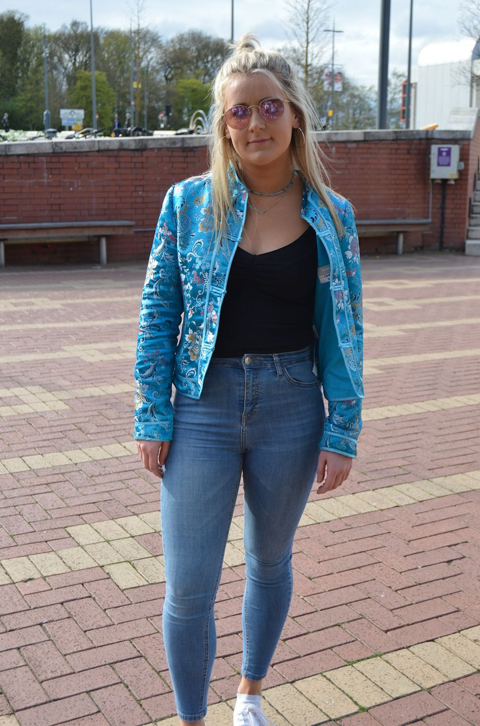 Image may contain: Sweater, Cardigan, Pants, Jeans, Denim, Clothing, Person, People, Human