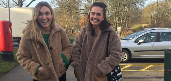 Image may contain: Sleeve, Sweatshirt, Overcoat, Coat, Automobile, Transportation, Car, Vehicle, Human, Person, Sweater, Apparel, Clothing