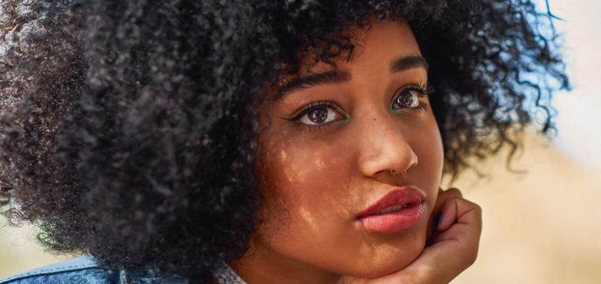 Image may contain: Person, People, Human, Hair, Afro Hairstyle