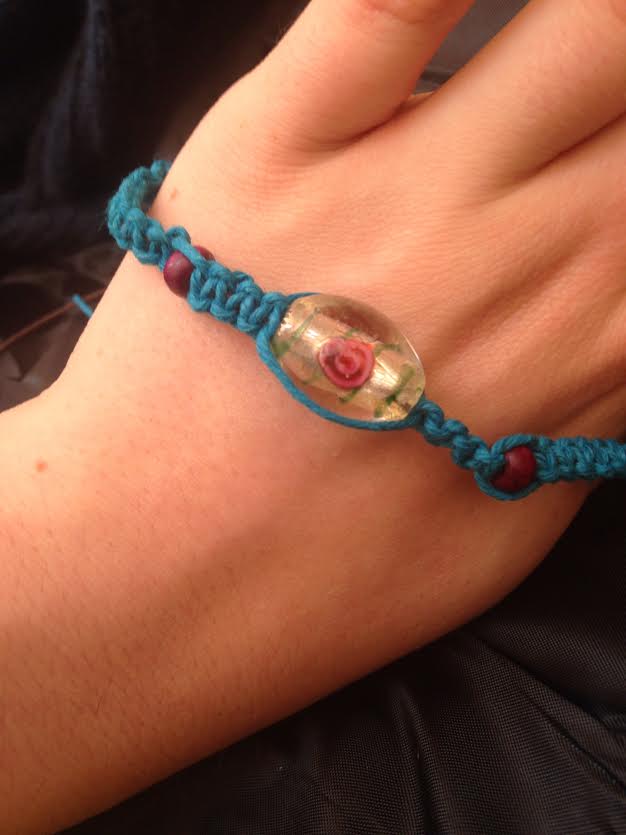 Never mind that scruffy bit of ribbon try having a handmade one of a kind festival band .