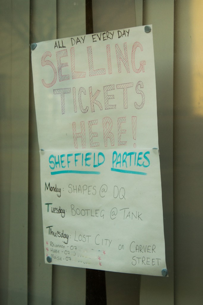 A kitchen window acts as a shopfront for ticket sellers.