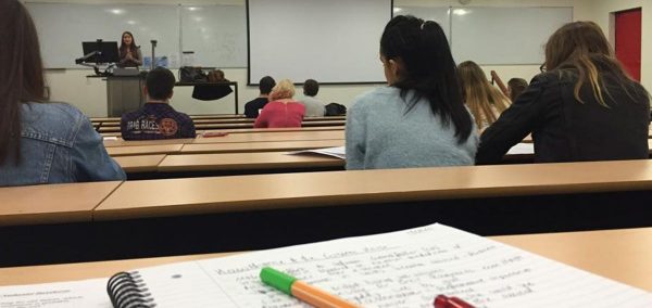 Image may contain: Room, Indoors, Classroom, Person, People, Human