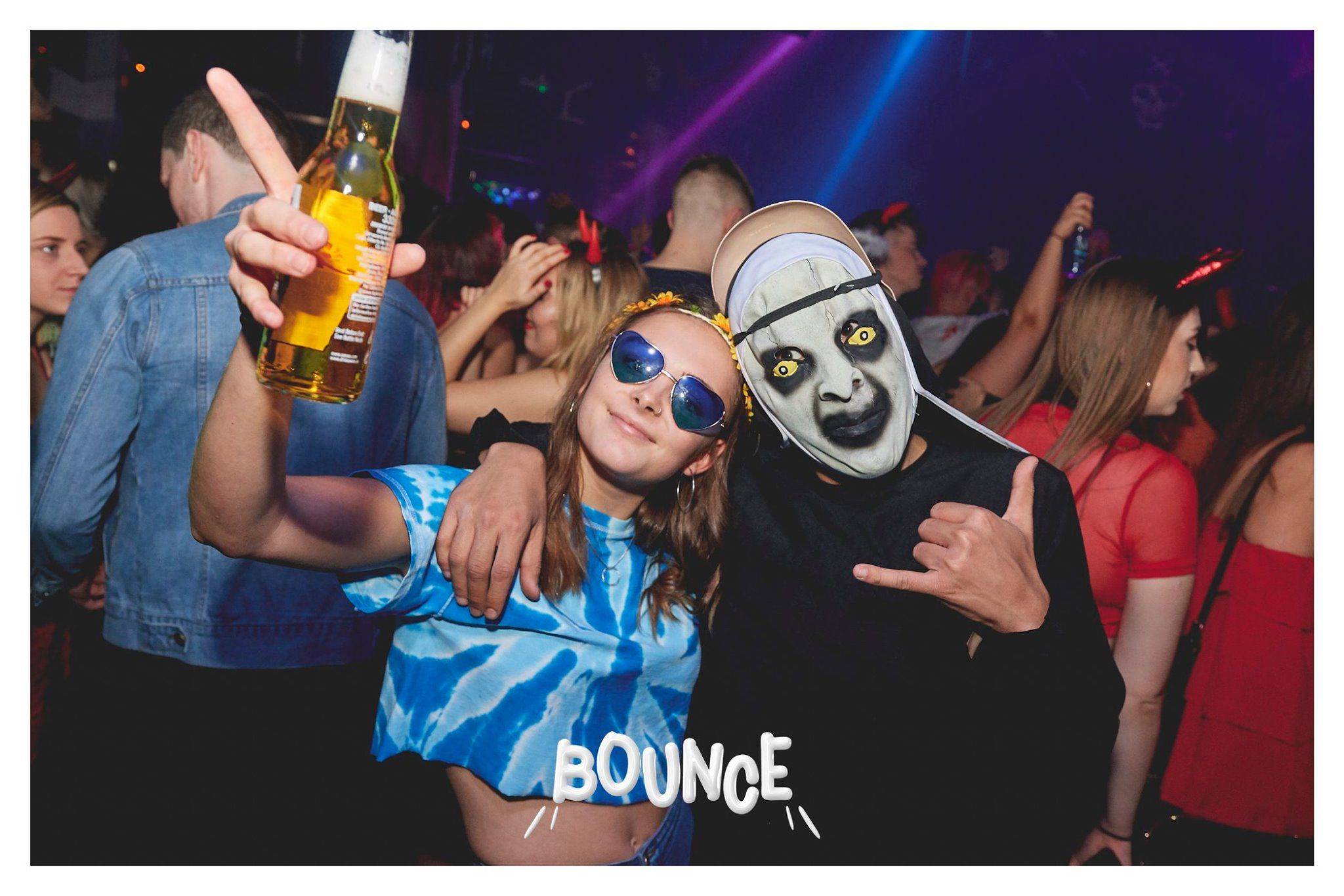 Image may contain: Club, Night Club, Party, Drink, Beer, Beverage, Alcohol, Human, Person, Accessory, Sunglasses, Accessories