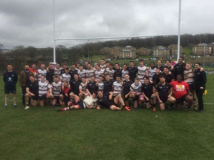 Image may contain: Building, Sport, Sports, Clothing, Apparel, People, Field, Crowd, Plant, Grass, Human, Person