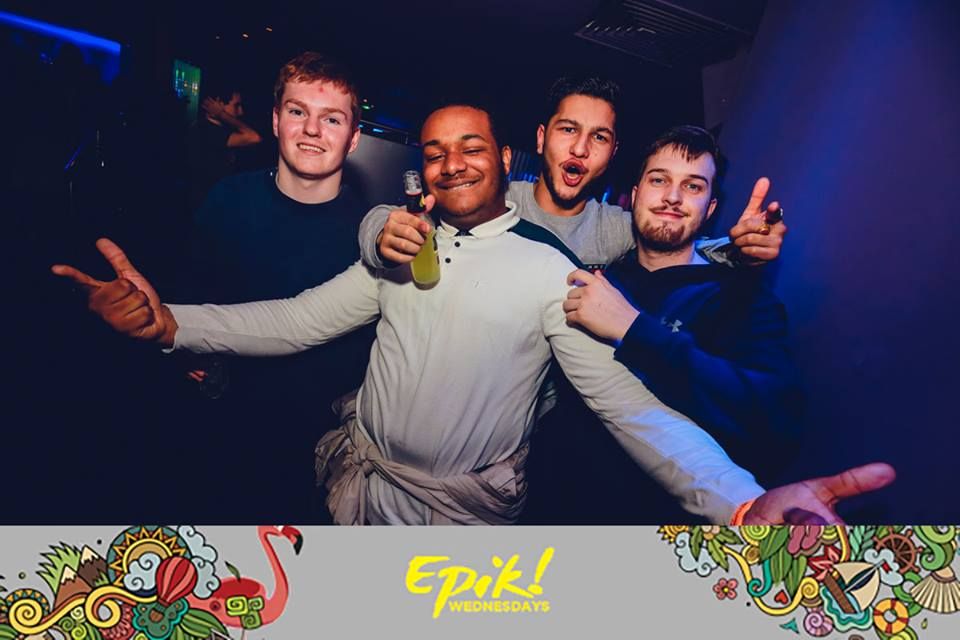 Image may contain: Club, Beverage, Drink, Clothing, Apparel, Face, Party, Human, Person