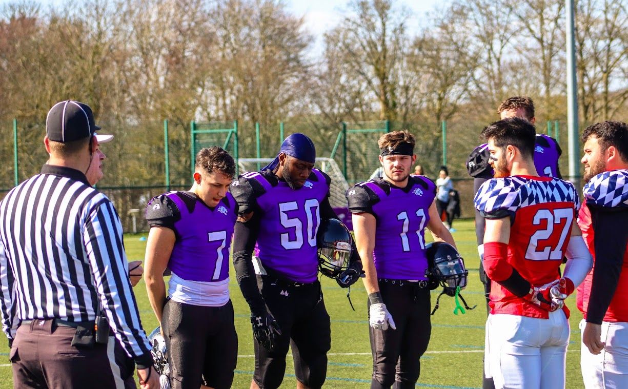 Image may contain: Football Helmet, American Football, Football, Team Sport, Team, Sports, Sport, Helmet, People, Apparel, Clothing, Person, Human