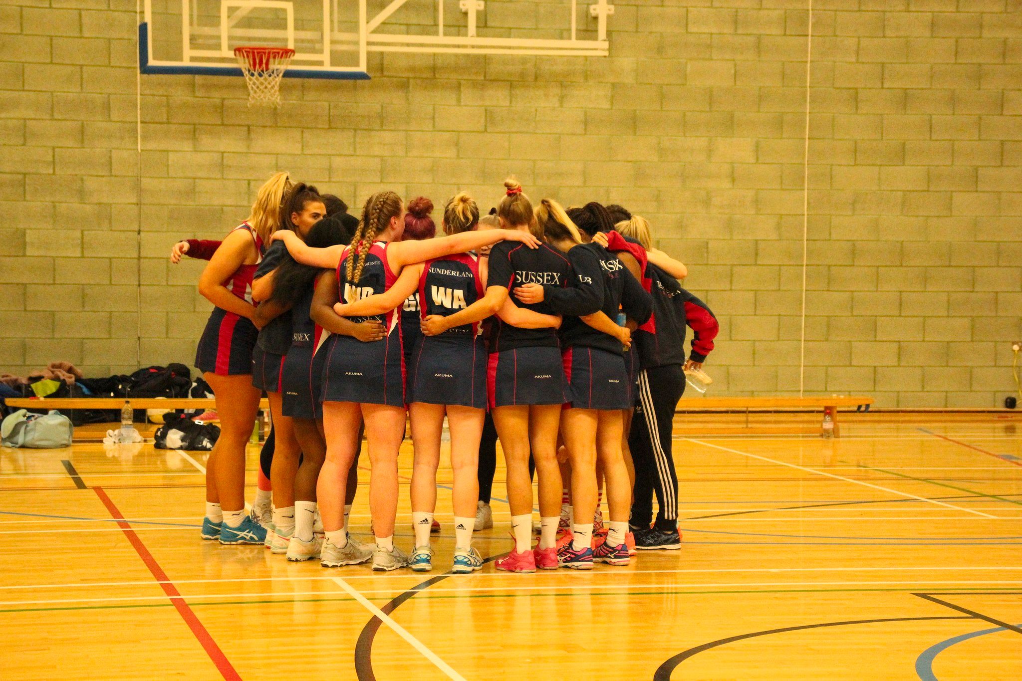 Image may contain: Sphere, People, Huddle, Crowd, Human, Person