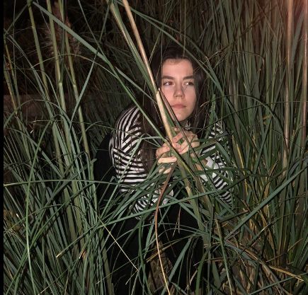Image may contain: Reed, Face, Rainforest, Lawn, Water, Human, Person, Jungle, Tree, Forest, Woodland, Grass, Land, Outdoors, Nature, Plant, Vegetation