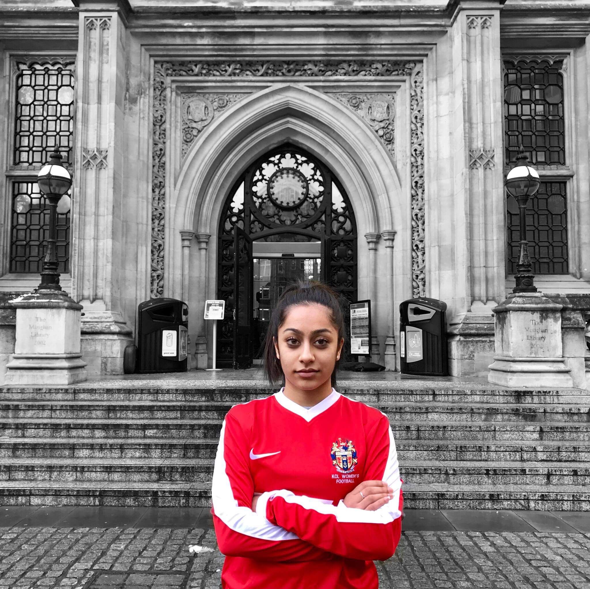 Image may contain: Building, Architecture, Arched, Arch, Person, People, Human