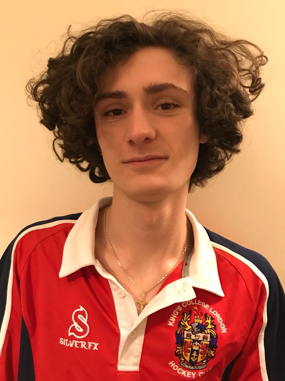 Image may contain: Trademark, Logo, Emblem, Badge, Person, People, Human