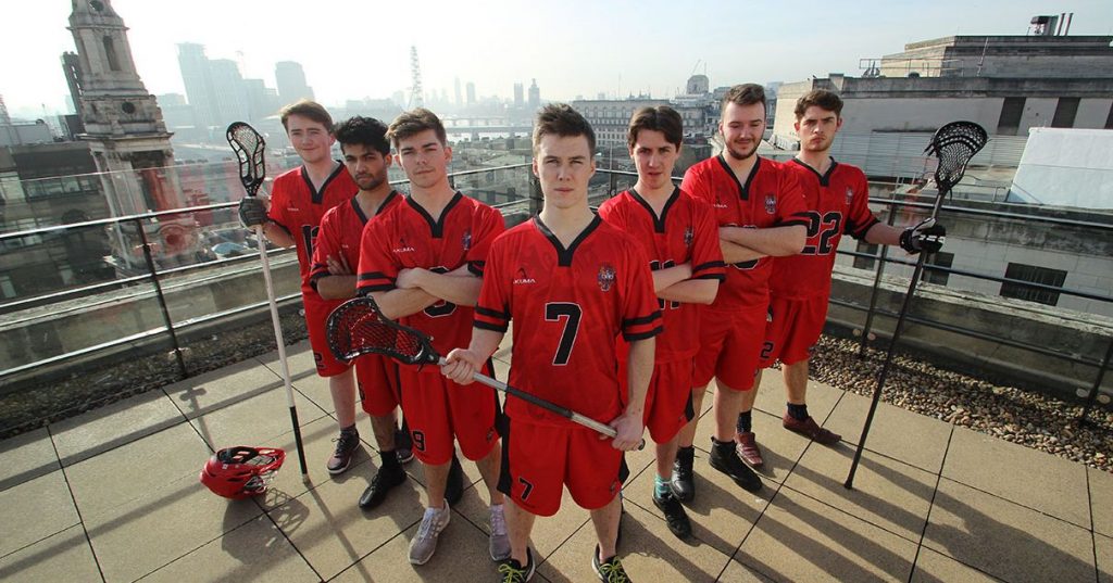 Image may contain: Footwear, Shoe, Long Sleeve, Racket, Tennis Racket, Crowd, Sleeve, People, Apparel, Clothing, Person, Human