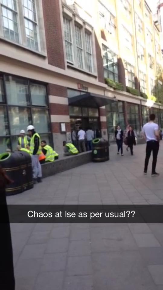Possibly builders waiting for news on a trapped colleague
