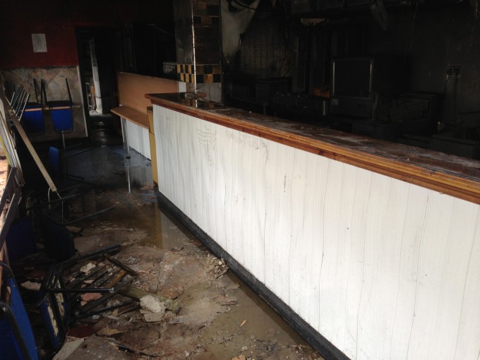 The sodden shell of Rooster House