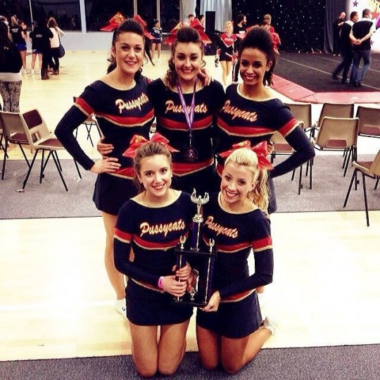 Cheerleading with trophy