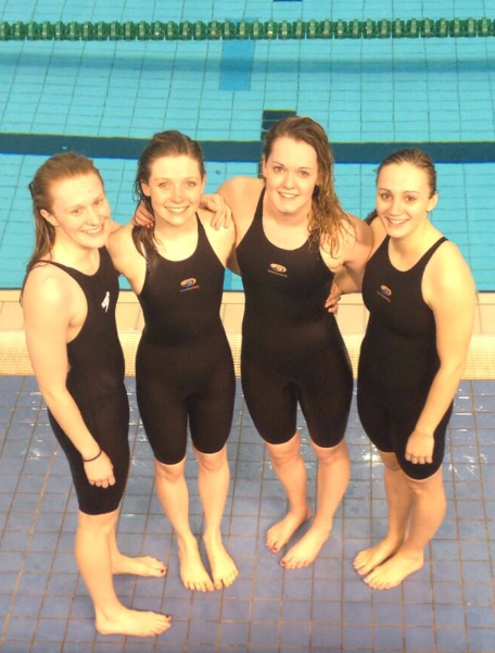 Charlotte and her medley relay team after their final