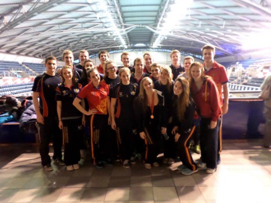 Charlotte and the team with her gold