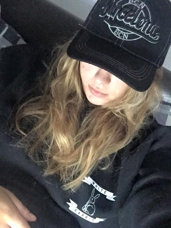 Reunited with her beloved hat