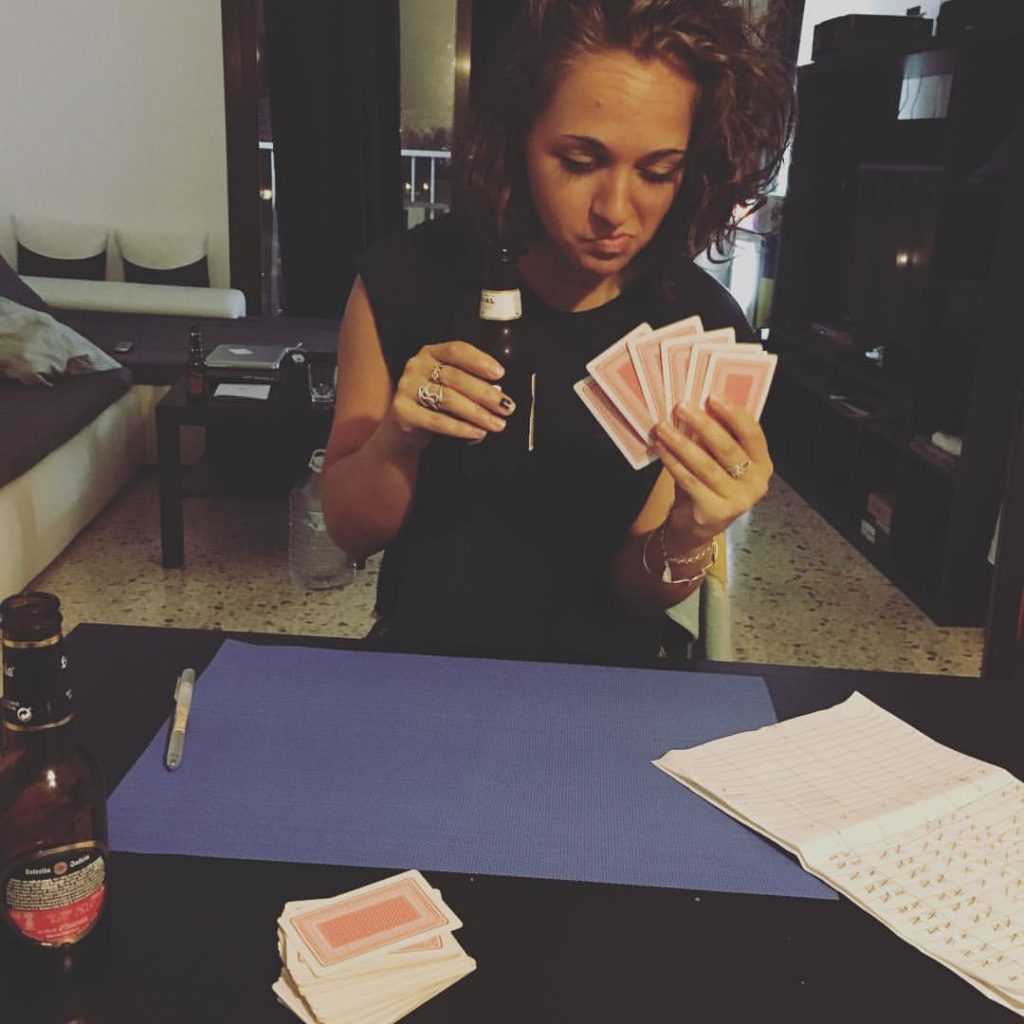 Girl with beer and cards