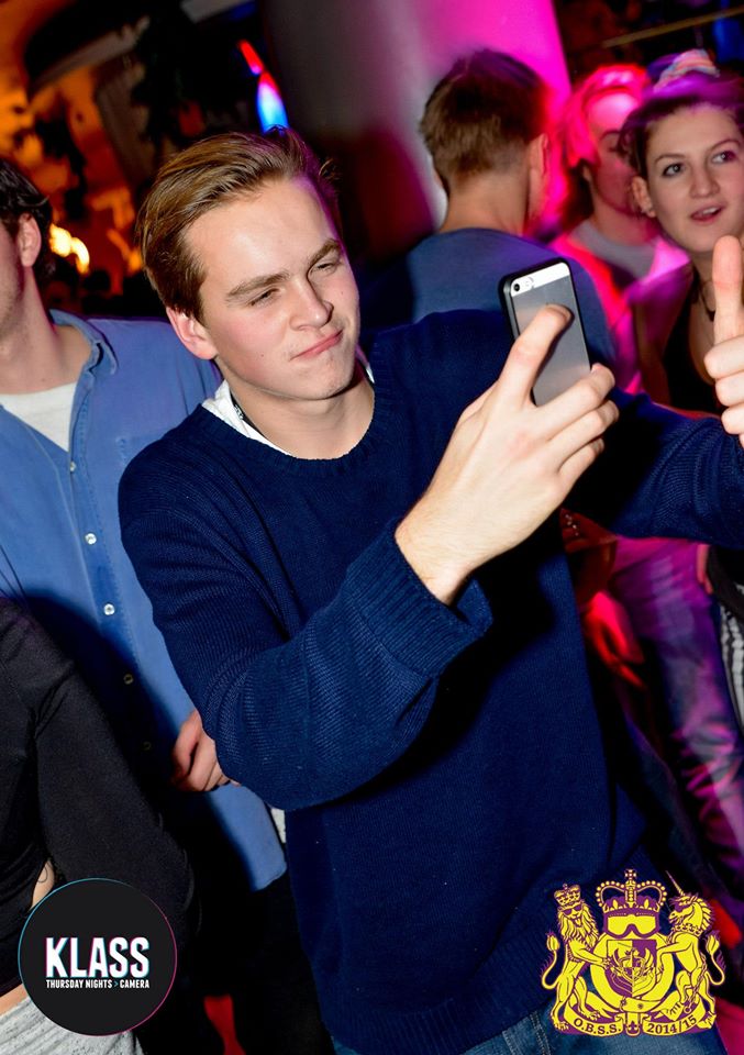 what is he taking a photo of?