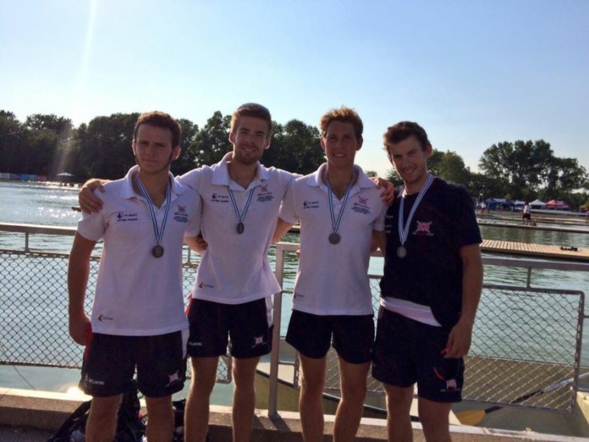 The team proudly wearing their silver medals