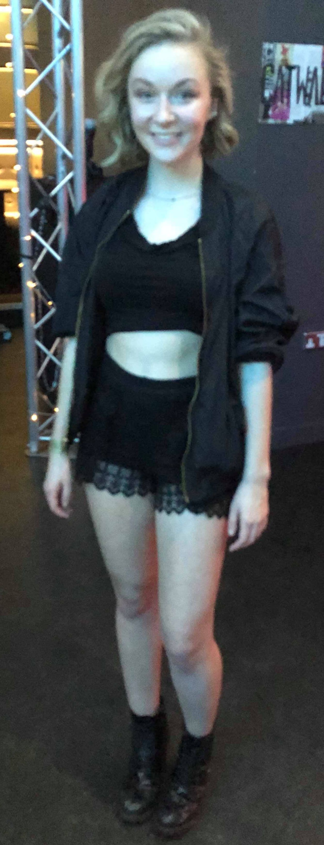 Image may contain: Sweater, Clothing, Cardigan, Person, People, Human