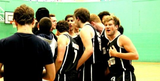 Hamish joins the team huddle
