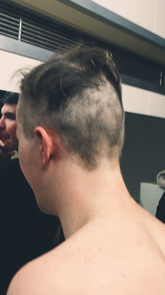 His mates shaved his head