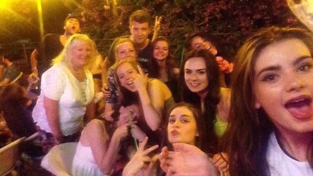 No one knows who the woman in the back is